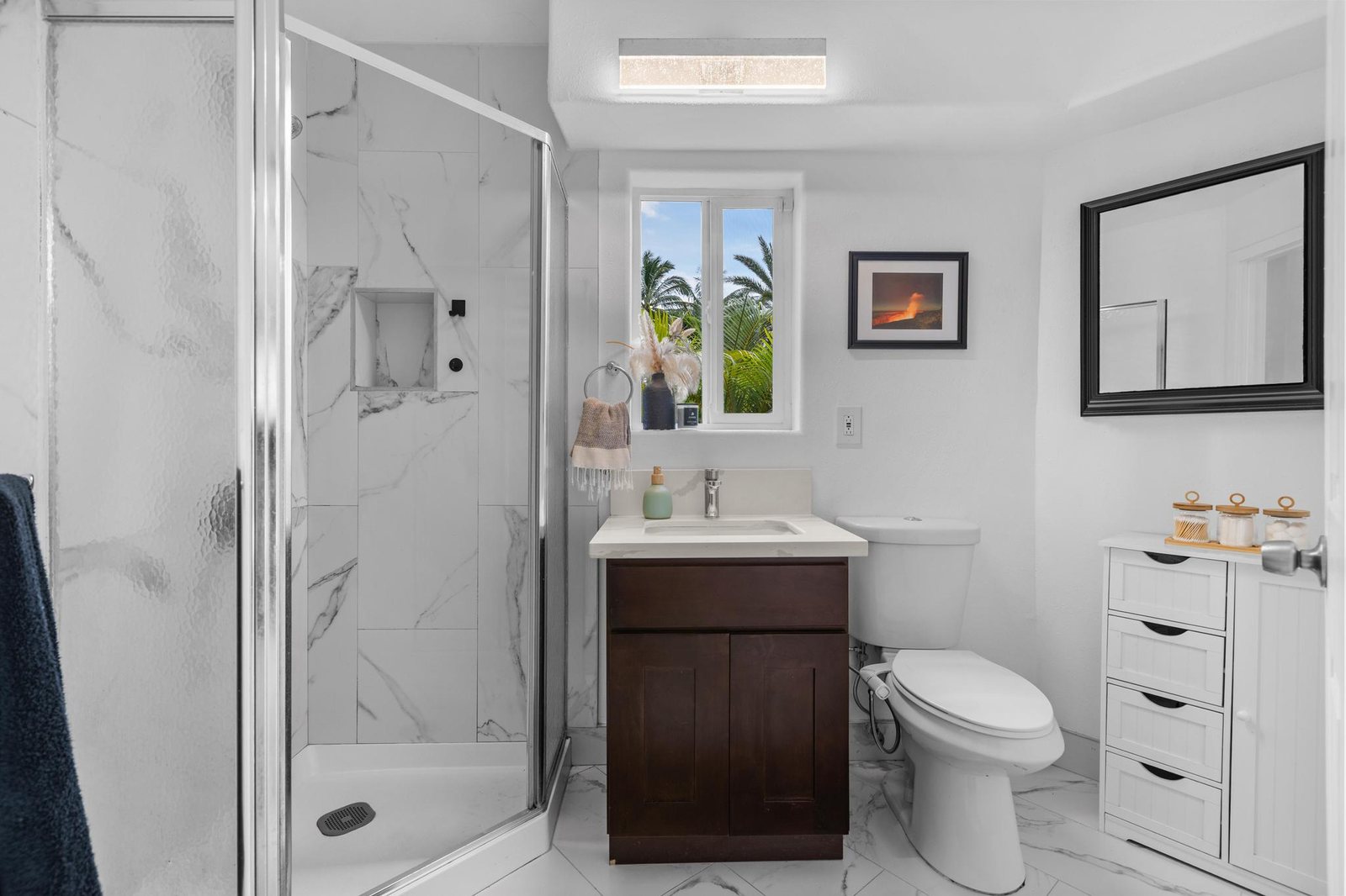 Garden-level full bath with glass shower