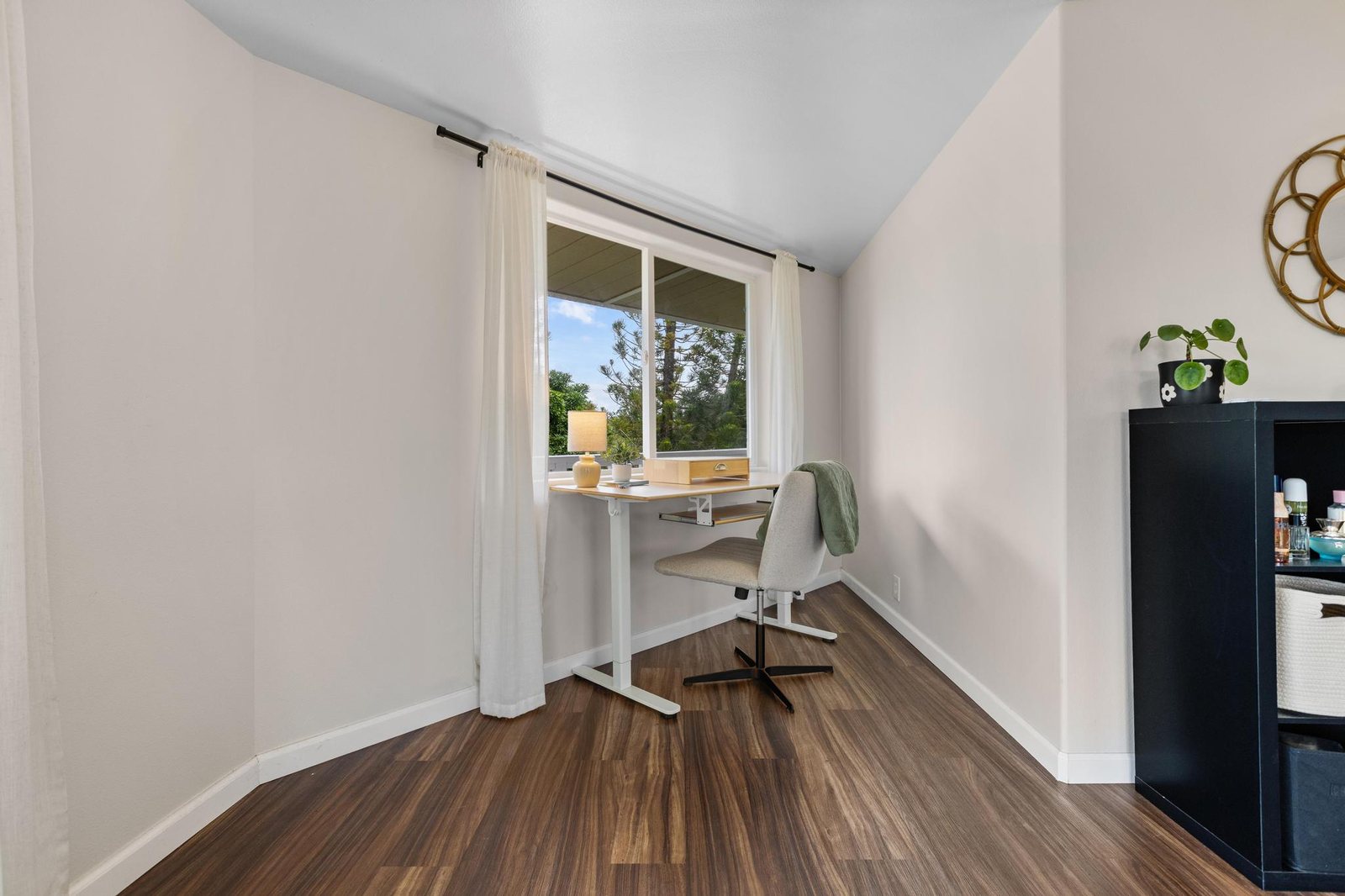 Desk beside a window in the primary suite