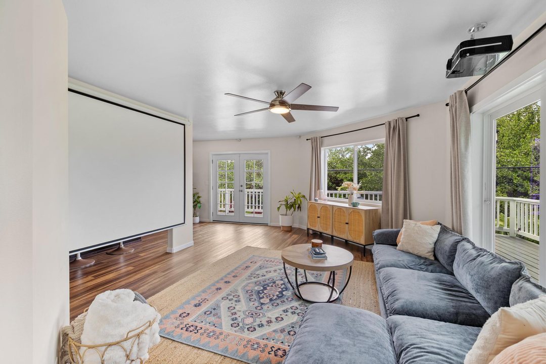 Family room set up with a projector screen