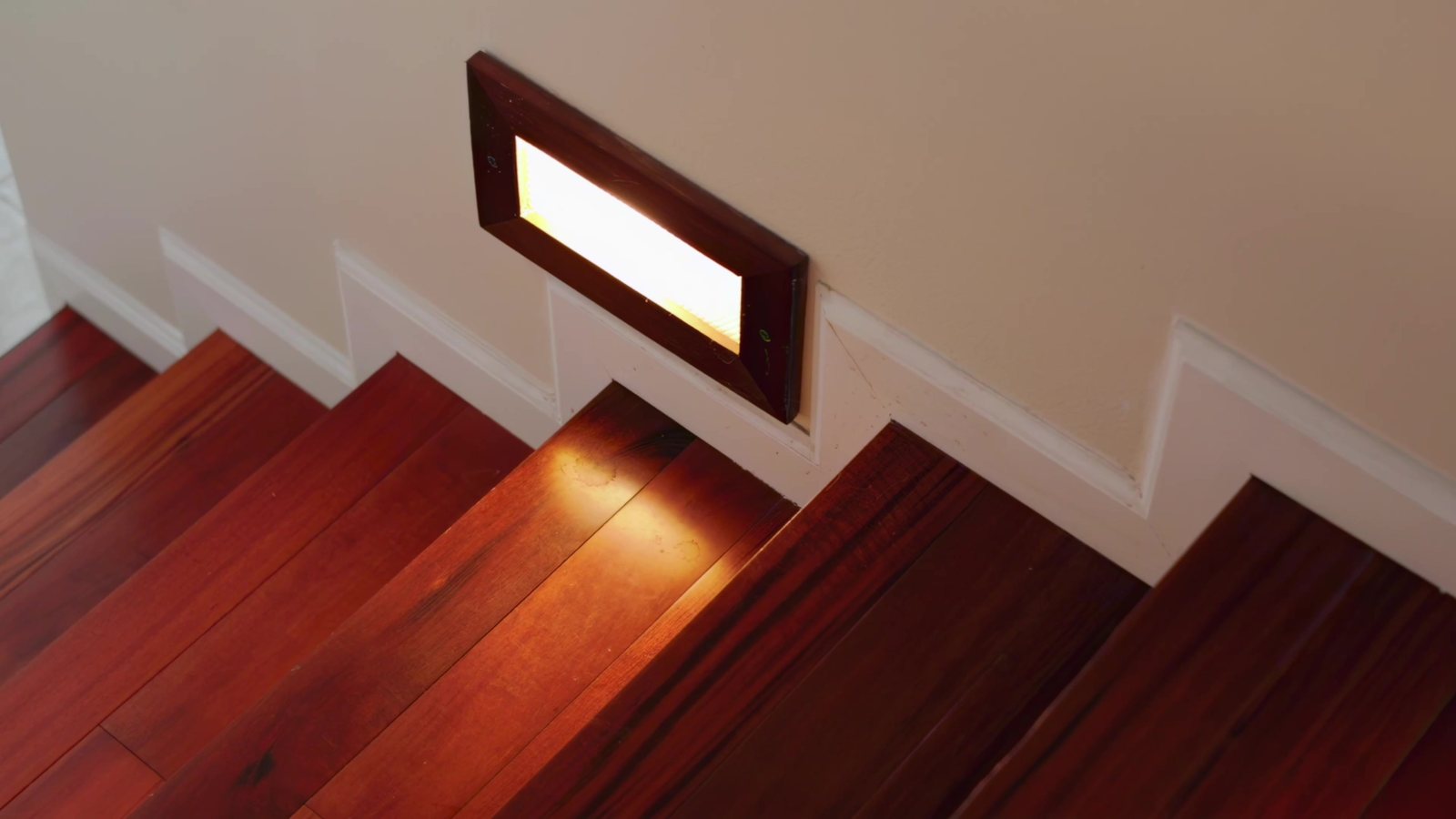 Stair with a step light connecting the three levels